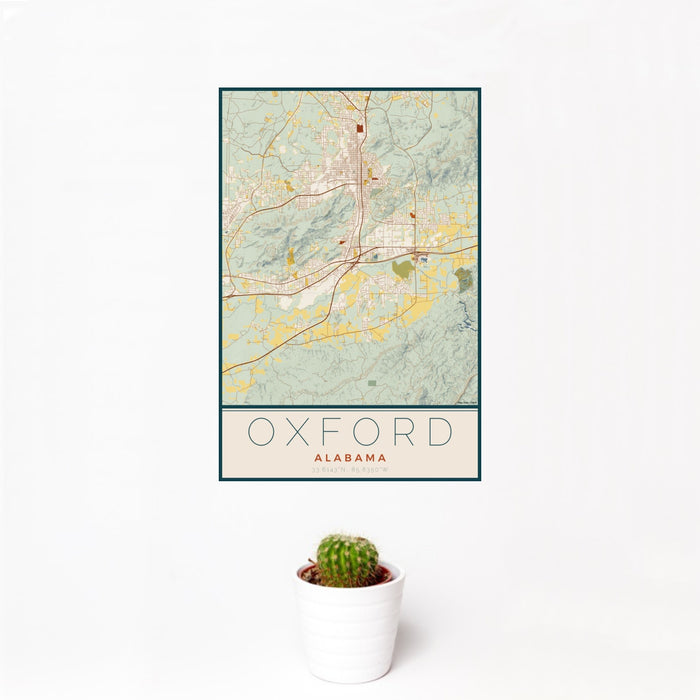12x18 Oxford Alabama Map Print Portrait Orientation in Woodblock Style With Small Cactus Plant in White Planter