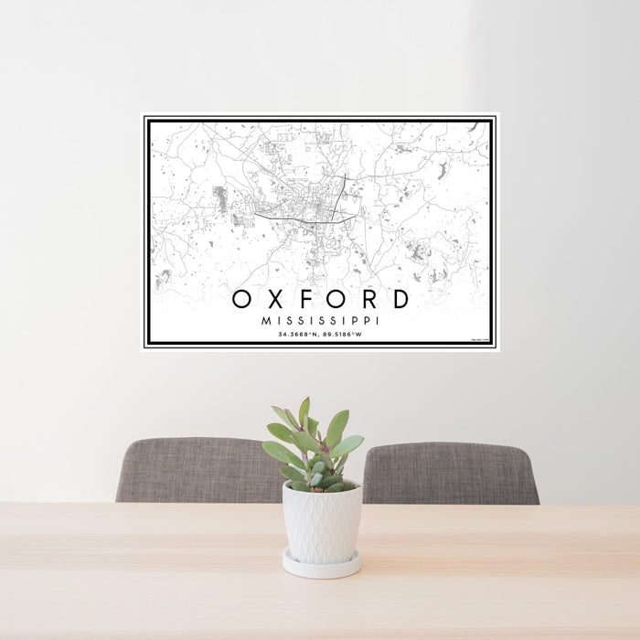24x36 Oxford Mississippi Map Print Landscape Orientation in Classic Style Behind 2 Chairs Table and Potted Plant