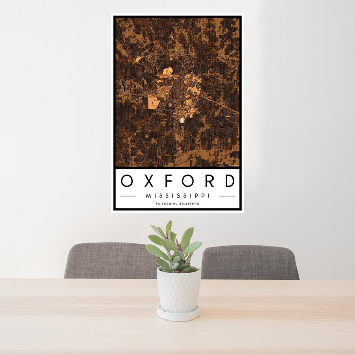 24x36 Oxford Mississippi Map Print Portrait Orientation in Ember Style Behind 2 Chairs Table and Potted Plant