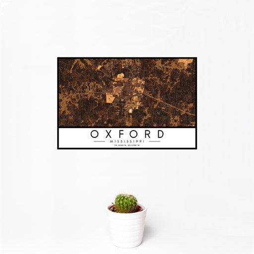 12x18 Oxford Mississippi Map Print Landscape Orientation in Ember Style With Small Cactus Plant in White Planter