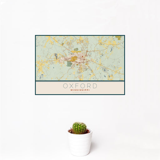 12x18 Oxford Mississippi Map Print Landscape Orientation in Woodblock Style With Small Cactus Plant in White Planter