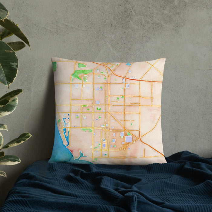 Custom Oxnard California Map Throw Pillow in Watercolor on Bedding Against Wall