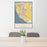 24x36 Oxnard California Map Print Portrait Orientation in Woodblock Style Behind 2 Chairs Table and Potted Plant