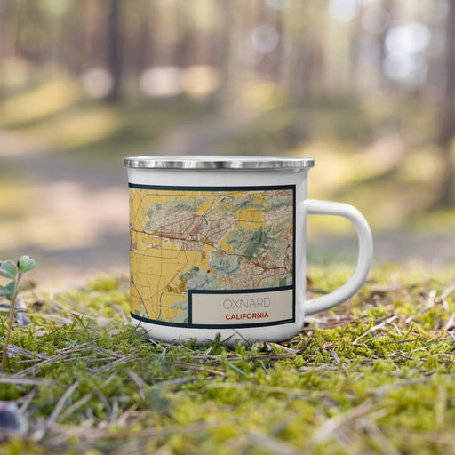Right View Custom Oxnard California Map Enamel Mug in Woodblock on Grass With Trees in Background