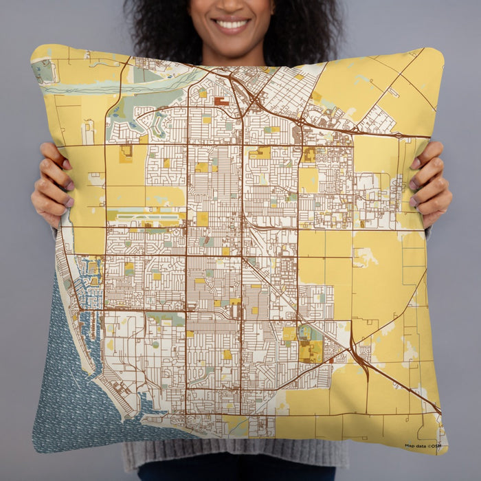 Person holding 22x22 Custom Oxnard California Map Throw Pillow in Woodblock