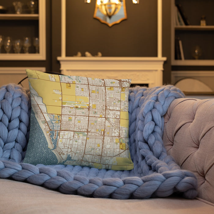 Custom Oxnard California Map Throw Pillow in Woodblock on Cream Colored Couch