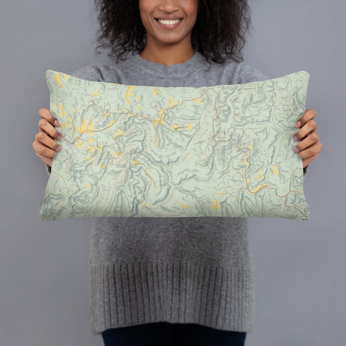 Person holding 20x12 Custom Ozark National Forest Arkansas Map Throw Pillow in Woodblock