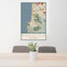 24x36 Pacifica California Map Print Portrait Orientation in Woodblock Style Behind 2 Chairs Table and Potted Plant
