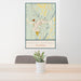 24x36 Pagosa Springs Colorado Map Print Portrait Orientation in Woodblock Style Behind 2 Chairs Table and Potted Plant