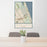 24x36 Palm Coast Florida Map Print Portrait Orientation in Woodblock Style Behind 2 Chairs Table and Potted Plant