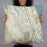 Person holding 22x22 Custom Palm Coast Florida Map Throw Pillow in Woodblock