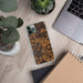 Custom Pangburn Arkansas Map Phone Case in Ember on Table with Laptop and Plant