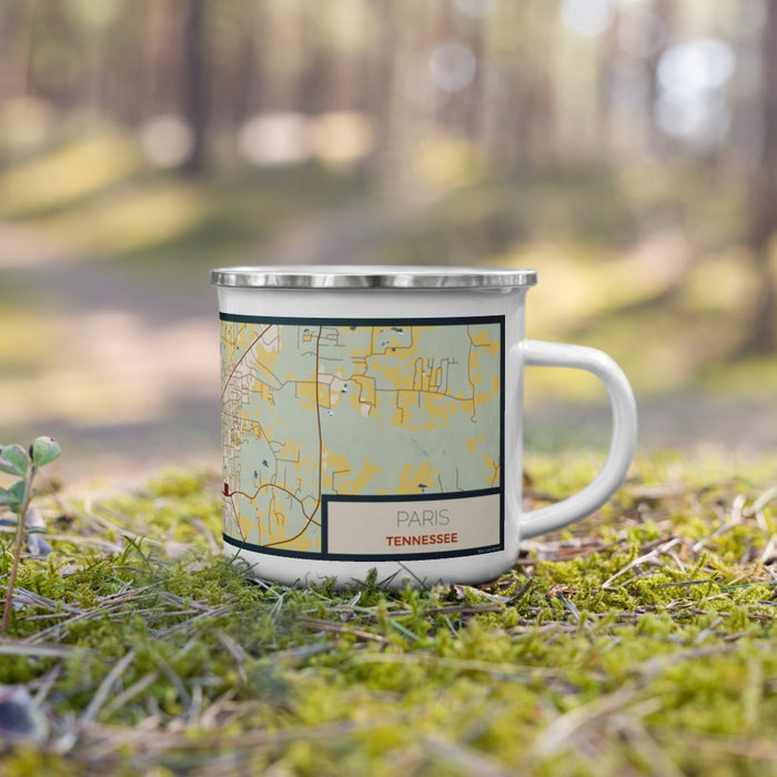 Right View Custom Paris Tennessee Map Enamel Mug in Woodblock on Grass With Trees in Background
