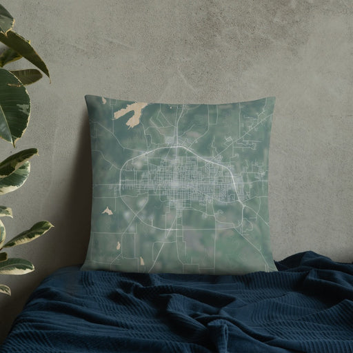 Custom Paris Texas Map Throw Pillow in Afternoon on Bedding Against Wall