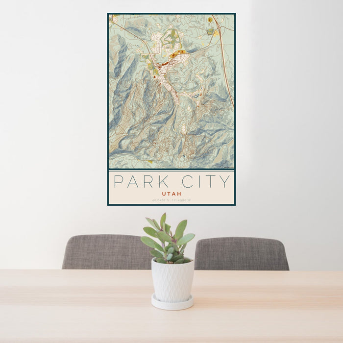24x36 Park City Utah Map Print Portrait Orientation in Woodblock Style Behind 2 Chairs Table and Potted Plant