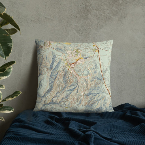 Custom Park City Utah Map Throw Pillow in Woodblock on Bedding Against Wall