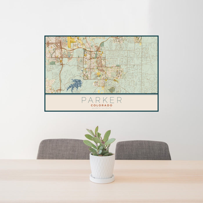 24x36 Parker Colorado Map Print Landscape Orientation in Woodblock Style Behind 2 Chairs Table and Potted Plant
