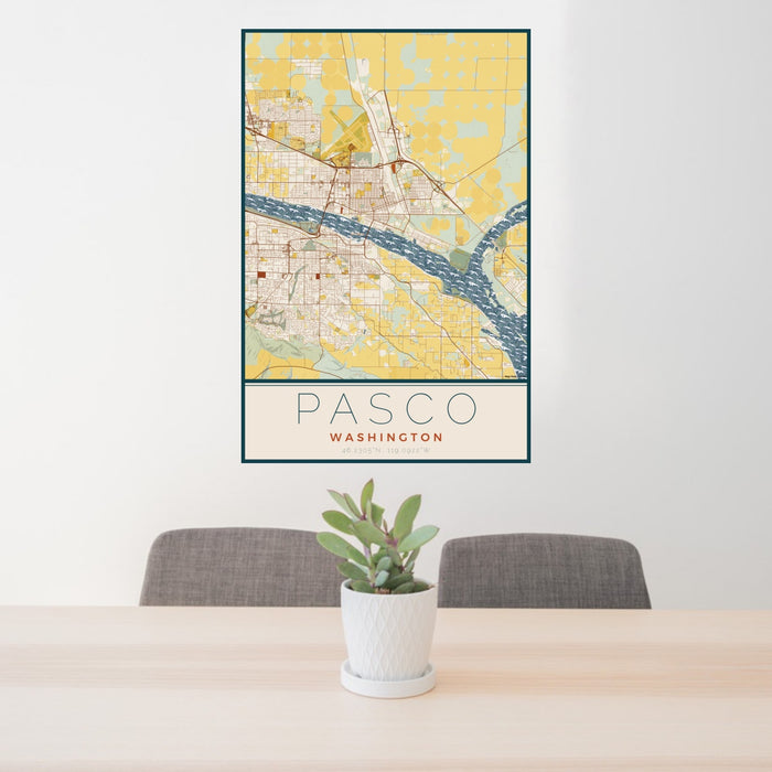 24x36 Pasco Washington Map Print Portrait Orientation in Woodblock Style Behind 2 Chairs Table and Potted Plant