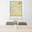 24x36 Paso Robles California Map Print Portrait Orientation in Woodblock Style Behind 2 Chairs Table and Potted Plant