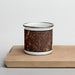 Front View Custom Passaic New Jersey Map Enamel Mug in Ember on Cutting Board