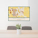 24x36 Patterson California Map Print Lanscape Orientation in Woodblock Style Behind 2 Chairs Table and Potted Plant