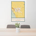 24x36 Patterson California Map Print Portrait Orientation in Woodblock Style Behind 2 Chairs Table and Potted Plant