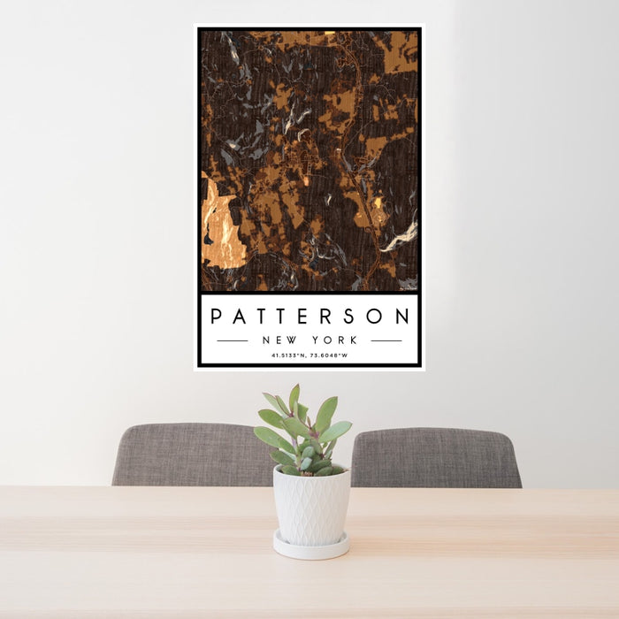 24x36 Patterson New York Map Print Portrait Orientation in Ember Style Behind 2 Chairs Table and Potted Plant