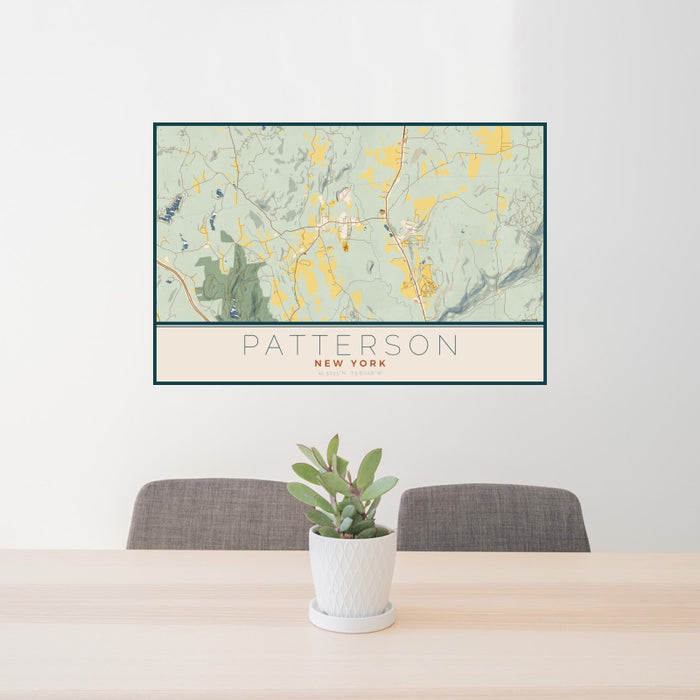 24x36 Patterson New York Map Print Landscape Orientation in Woodblock Style Behind 2 Chairs Table and Potted Plant
