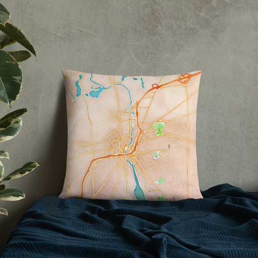 Custom Pawtucket Rhode Island Map Throw Pillow in Watercolor on Bedding Against Wall