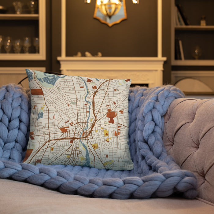 Custom Pawtucket Rhode Island Map Throw Pillow in Woodblock on Cream Colored Couch