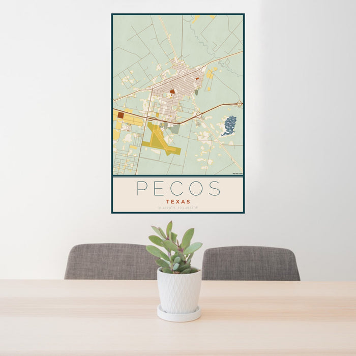 24x36 Pecos Texas Map Print Portrait Orientation in Woodblock Style Behind 2 Chairs Table and Potted Plant