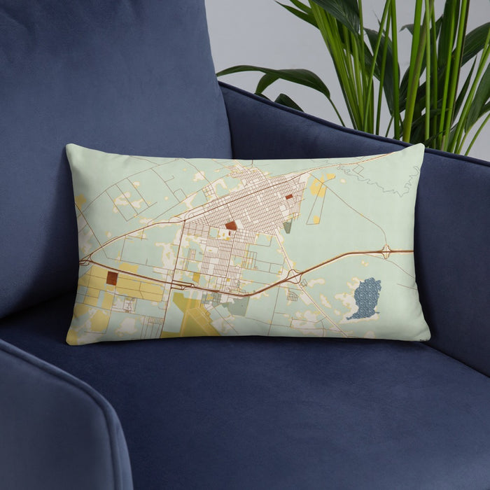 Custom Pecos Texas Map Throw Pillow in Woodblock on Blue Colored Chair