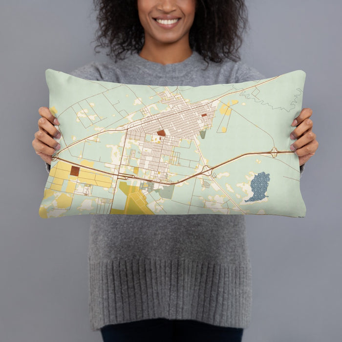 Person holding 20x12 Custom Pecos Texas Map Throw Pillow in Woodblock