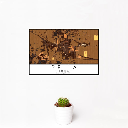 12x18 Pella Iowa Map Print Landscape Orientation in Ember Style With Small Cactus Plant in White Planter