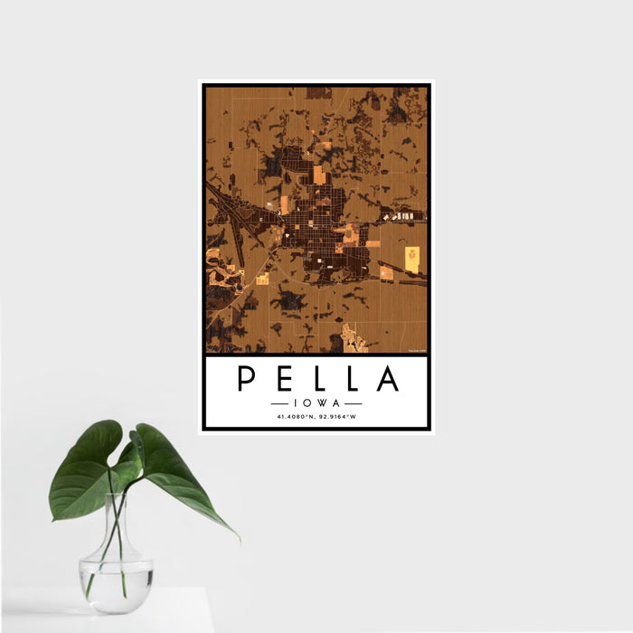 16x24 Pella Iowa Map Print Portrait Orientation in Ember Style With Tropical Plant Leaves in Water