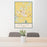 24x36 Pella Iowa Map Print Portrait Orientation in Woodblock Style Behind 2 Chairs Table and Potted Plant