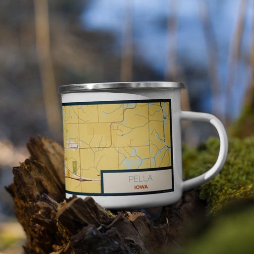 Right View Custom Pella Iowa Map Enamel Mug in Woodblock on Grass With Trees in Background
