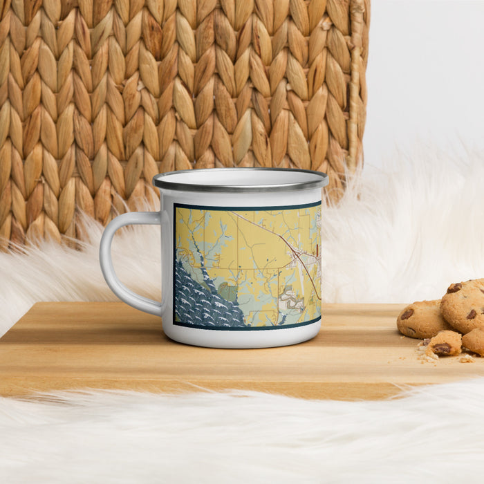 Left View Custom Pella Iowa Map Enamel Mug in Woodblock on Table Top