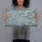 Person holding 20x12 Custom Pendleton Oregon Map Throw Pillow in Afternoon
