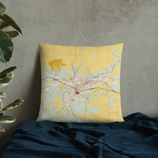 Custom Pendleton Oregon Map Throw Pillow in Woodblock on Bedding Against Wall
