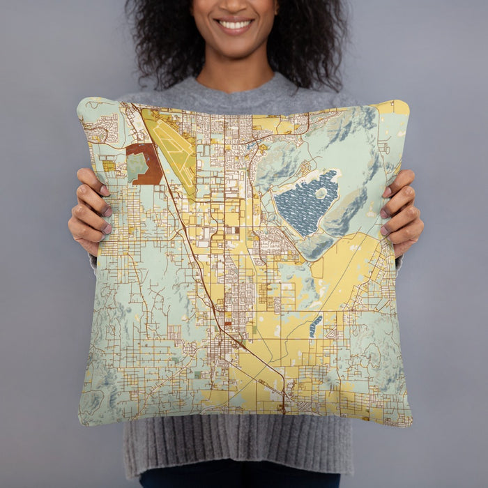 Person holding 18x18 Custom Perris California Map Throw Pillow in Woodblock