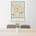 24x36 Petaluma California Map Print Portrait Orientation in Woodblock Style Behind 2 Chairs Table and Potted Plant