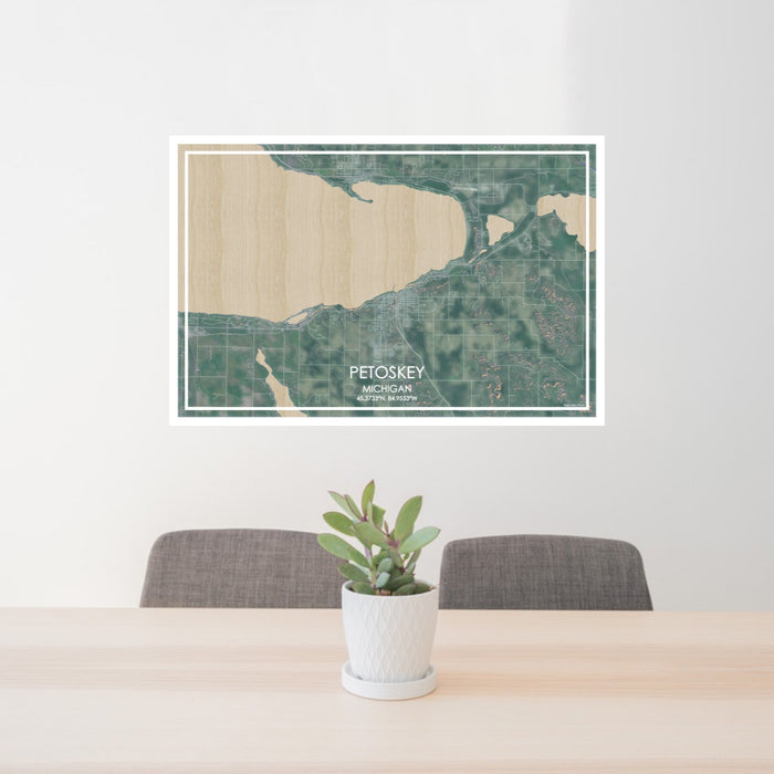 24x36 Petoskey Michigan Map Print Lanscape Orientation in Afternoon Style Behind 2 Chairs Table and Potted Plant