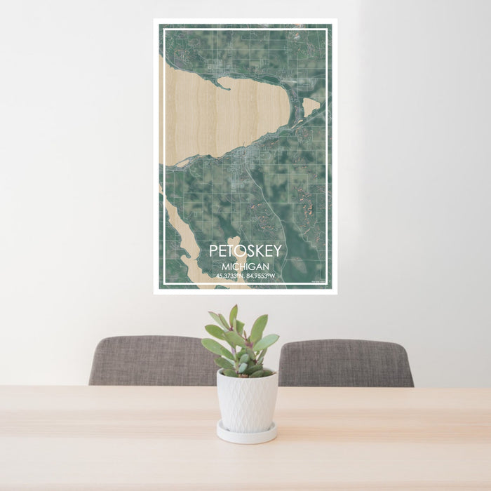 24x36 Petoskey Michigan Map Print Portrait Orientation in Afternoon Style Behind 2 Chairs Table and Potted Plant