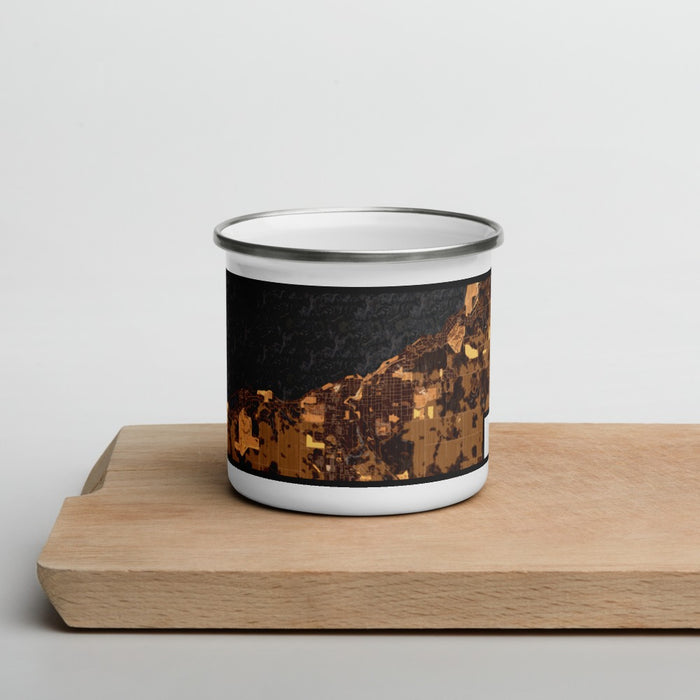 Front View Custom Petoskey Michigan Map Enamel Mug in Ember on Cutting Board