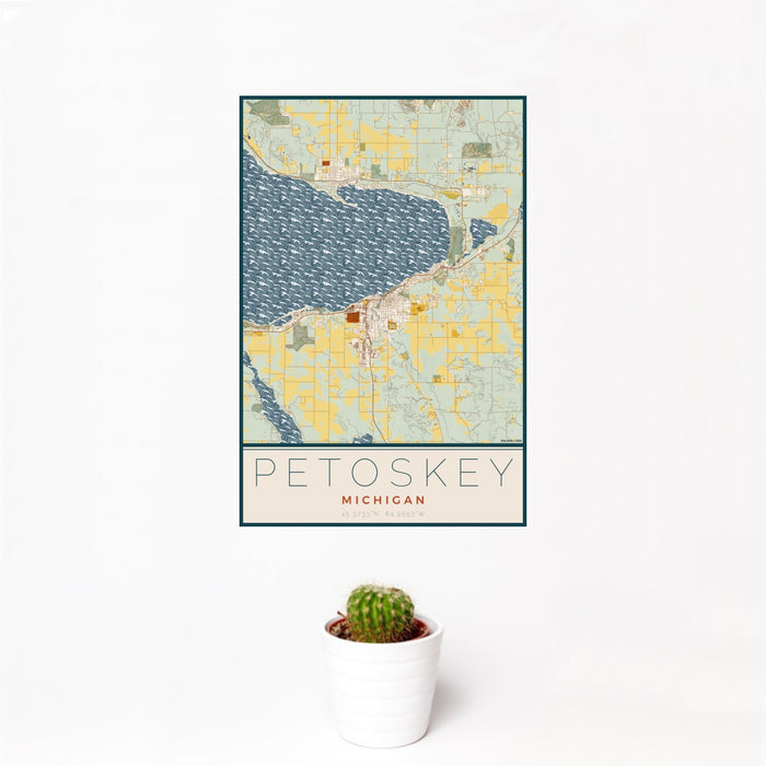 12x18 Petoskey Michigan Map Print Portrait Orientation in Woodblock Style With Small Cactus Plant in White Planter