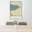 24x36 Petoskey Michigan Map Print Portrait Orientation in Woodblock Style Behind 2 Chairs Table and Potted Plant