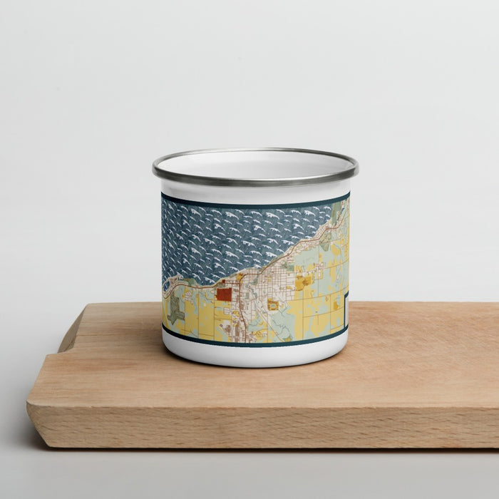 Front View Custom Petoskey Michigan Map Enamel Mug in Woodblock on Cutting Board
