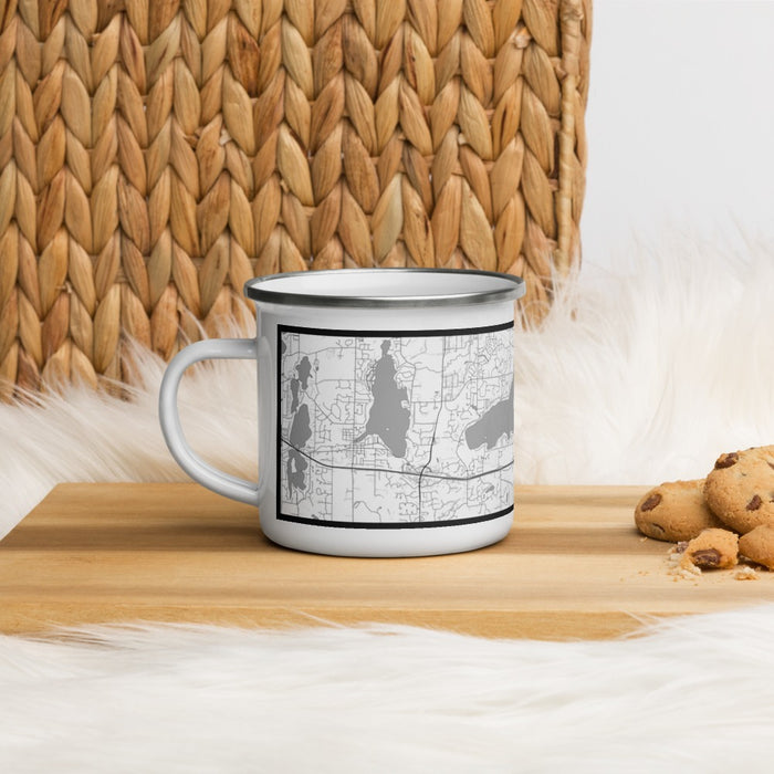 Left View Custom Pewaukee Lake Wisconsin Map Enamel Mug in Classic on Table Top