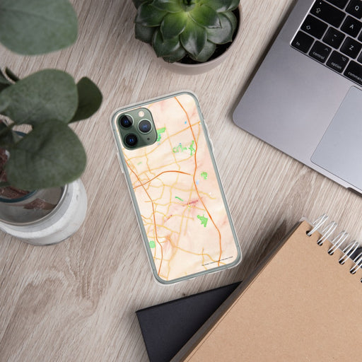 Custom Pflugerville Texas Map Phone Case in Watercolor on Table with Laptop and Plant